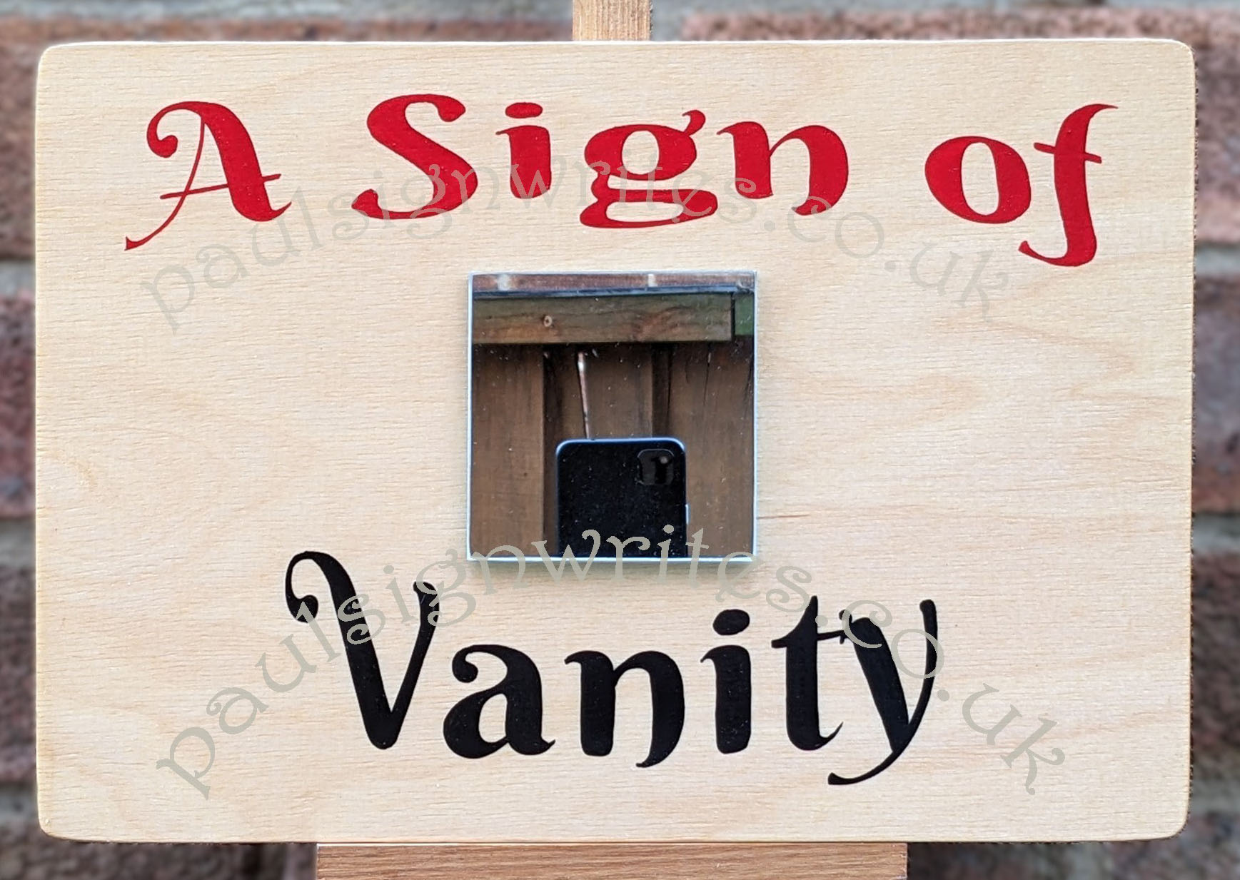 A Sign of Vanity Hand painted sign.